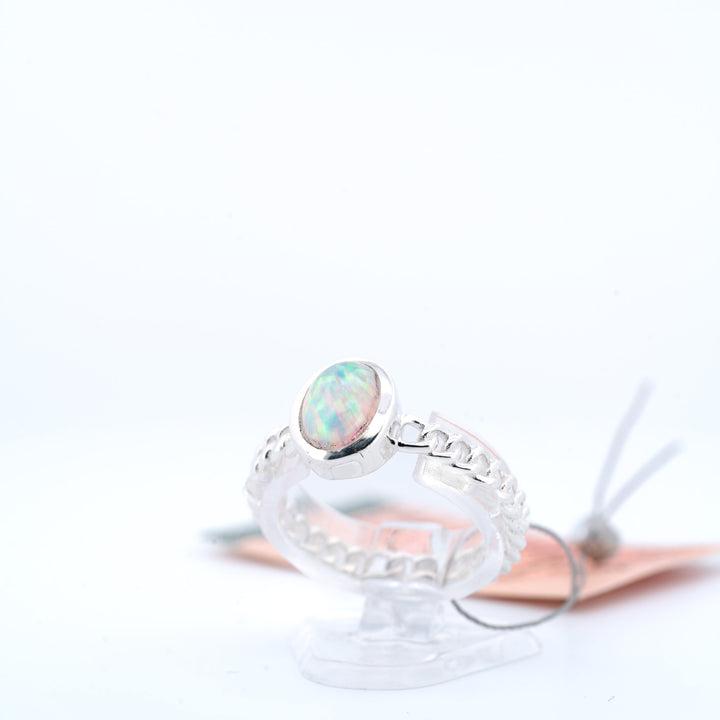 Sidabrinis žiedas su Etiopijos opalu "Šviesos Tiltas"