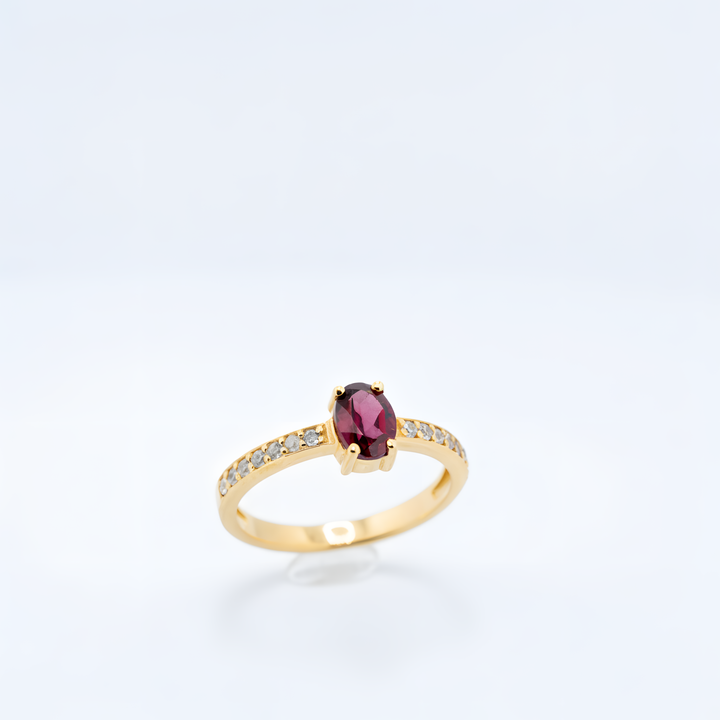 Paauksuotas sidabrinis žiedas su granatu „Raudonos šviesos kelias“