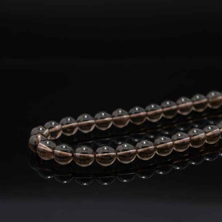 Dūminio kvarco karoliukų gija 10 mm