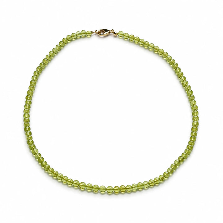 Peridoto karoliai 5 mm