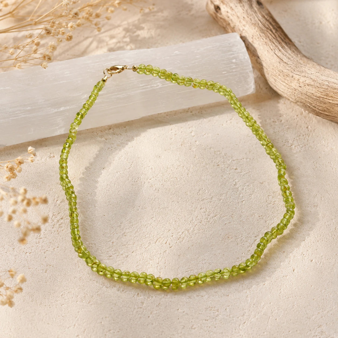 Peridoto karoliai 5 mm